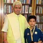 LG Sinha meets 12-Year national level Chapion Amaan Khan from Baramullah , Kashmir , at Raj Bhawan on Thursday.