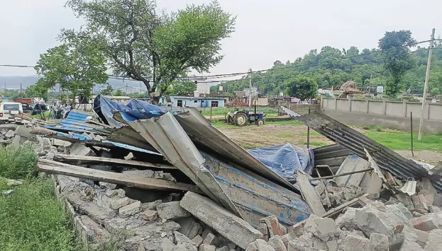 Police demolish illegal structures built for cattle smuggling at Nagrota